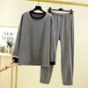 Conjunto quente de duas peças plus size para outono e inverno, novo estilo de veludo alemão listrado solto com mangas morcego e calças com punho, roupa de casa