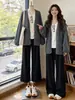 Abrigo suéter grueso de lunares gris retro, nueva colección otoño/invierno 2026, manga de farol, corte holgado, cárdigan de punto casual para mujer