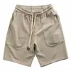 Shorts Esportivos Casuais Versáteis de Verão com Cordão Elástico para Homens Marca da Moda Cor Sólida Soltos