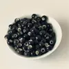 Venta al por mayor de fábrica 6 mm esmalte de color cuentas sueltas de cerámica cuentas de cerámica de color pulsera con cuentas saquito con cuentas