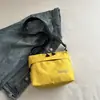 Bolso bandolera deportivo sencillo para hombres y mujeres, mochila pequeña nueva de cuadros, bolso de hombro casual para el trabajo para parejas, bolso de moda para hombre