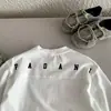 Moletom Infantil Primavera e Outono 2026 Novo Estilo Camiseta Infantil Gola Redonda Top Casual Solto Camiseta Básica Tendência para Crianças