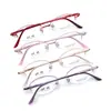 Montura de gafas de medio aro ovalada simple retro de titanio puro al por mayor para cara pequeña miopía montura de gafas de placa de montura pequeña para mujer