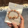 Libro Caperucita Roja Mismo Estilo Estudiante Pulsera de Glaseado de Palomitas de Maíz Hecha a Mano con Cuentas Dibujos Animados Cristal Pulsera Infantil Venta al por Mayor Cajas de Regalo