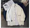 Camisa casual de manga larga suelta y cómoda, moda casual estilo Hong Kong para hombre de otoño, camisa de trabajo personalizada con estampado de moda