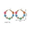 Pendientes de aleación con forma de flor y cuentas de colores de viento dulce a la moda para mujeres y niñas que viajan diariamente a fiestas navideñas.