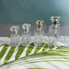 Botella de perfume de vidrio de bayoneta al por mayor 20ml30ml botella transparente para rellenar con agua 50ml100ml material blanco cristal