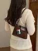 Bolso vintage de venta caliente transfronterizo para mujer, nuevo bolso de hombro versátil de moda 2026, bolso de axila, bolso tipo empanada para ir al trabajo