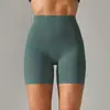 Pantalones de yoga de estilo nuevo sin línea de vergüenza color piel para mujer, cintura alta, realce de glúteos, compresión abdominal, shorts deportivos de tres puntos