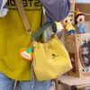 Bolsa de Mão com Fechamento de Cordão Fresca Estilo Montanha para Uso Externo Modelo Novo Bolsa para Meninas Compras Bolsa para Câmera Bolsa de Ombro Energética