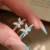 Anillo y pendientes de mariposa de corindón rojo brillante vintage francés, Pendientes de botón de mariposa de doble ala con gema de color Paraíba