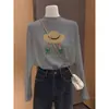 Camiseta interior térmica de cuello semi-alto engrosado en color albaricoque, nuevo modelo de principios de otoño 2026, camiseta térmica de manga larga para mujer