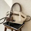 Bolsas de Mujer Transfronterizas 2026 Nueva Moda Retro Bolso Cruzado de Cuero Mate para Mujer Bolso de Mano Súper Popular Bolso Cesta para Mujer