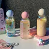 Taza de vidrio de borosilicato alto resistente a altas temperaturas taza láser para niñas alto valor de color taza pequeña portátil para sorber taza de agua fresca de verano