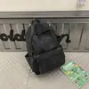 Mochila Escolar Retro Americana para Estudiantes de Secundaria Femeninas, Mochila de Marca de Moda 2026 Nueva Mochila para Estudiantes Universitarios de Gran Capacidad para Hombres