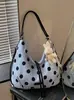 Bolso de hombro fresco y dulce de lunares para mujer, nuevo bolso de moda 2026 para debajo del brazo, bolso tote versátil de alta gama para el trabajo