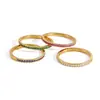 Anillos apilables Wanxing de acero inoxidable chapado en oro de 18 quilates de cuatro colores con circonitas microincrustadas para mujer, estilo clásico, múltiples tamaños, venta al por mayor transfronteriza