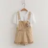 26032 Conjunto de dos piezas con colgante de muñeca de dibujos animados dulce estilo universitario estilo japonés: camiseta de mujer + pantalones de falda con tirantes