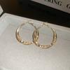 Aretes de aguja de plata de alta calidad con diamantes retorcidos, aretes iguales para celebridades de internet, nuevos aretes de temperamento de alta calidad al por mayor de Europa y Estados Unidos.