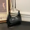 Bolsa de Axila de Nicho de Luxo para Mulheres 2026 Nova Moda Popular de Verão para o Dia a Dia Ombro Único Transversal Bolsa Meia-Lua