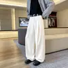 Nuevos pantalones casuales de otoño para hombre, estilo Hong Kong, corte holgado, marca trendy japonesa, pantalones ajustados para jóvenes, pierna ancha y bajo ancho