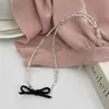 Corrente para Clavícula Elegante e de Alto Padrão com Laço Prata Quebrada Estilo Doce e Descolado Personalizado Luxo Acessível Design Ins para Mulheres