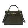 Bolso de mano texturizado con patrón de cocodrilo para mujer, nueva colección 2026, bolso de estilo Kelly, de nicho y lujoso, adecuado para el trabajo y el uso casual, se puede llevar como bolso de hombro o bolso cruzado