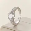 Duowei Europeo y Americano Transfronterizo Deseo Aliexpress Joyería Más Vendida Forma de Gota de Agua Pera Anillo de Cobre Incrustado de Diamantes Modelo Nuevo Al Por Mayor