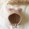 Touca de Bebê Outono e Inverno Urso Sem Costura Fofa Duas Bolas Quente Proteção de Orelha Touca para Recém-Nascido Touca Fetal Venda por Atacado