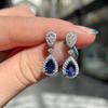 Venta caliente transfronteriza pendientes de industria pesada pendientes de circonita azul real súper brillantes europeos y americanos fabricantes de pendientes de moda de alta calidad de lujo ligero para mujeres