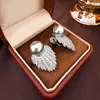 Pendientes de Pluma de Diamante Completo Aguja de Plata Perla Pendientes de Clip de Bobina de Mosquito Retro de Lujo Ligero Europeo y Americano Pendientes de Moda Elegantes para Mujer