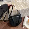 2026 Nueva Hebilla de Cinturón Simple Transfronteriza Bolso de Silla de Montar Portátil, Popular Textura Vintage Bolso Versátil de Hombro Cruzado para Mujer
