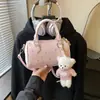 Bolso de mano de gran capacidad estilo coreano, bolso de hombro de alta gama, bolso cruzado de diseño único, bolso de moda para mujer