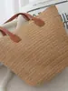 Bolsas tejidas de paja personalizadas para mujer 2026 Nuevo bolso de hombro de verano para viajes de vacaciones Bolso tote de moda para el trabajo