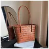 Bolsa de mano tejida nueva de primavera 2026 Bolsa con nudo de bambú Bolso de mano simple vintage Bolsa de compras de gran capacidad Bolsa tejida
