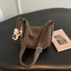 Bolso de trabajo y para el día a día de estilo retro de alta gama, nueva moda otoño 2026, bolso de hombro tipo tote estudiantil único de gran capacidad