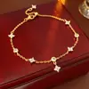 Pulsera de Trébol de Cuatro Hojas con Circonita y Nácar Lujo Accesible Pulsera Elegante de Gama Alta Nuevo Estilo Caliente 2026 Pulsera al por Mayor para Mujeres
