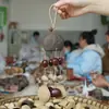 Cascabel Campana de Mano Carrillón Colgante de Bolsa Hecho a Mano Rayo de Sonido Cascabel Colgante Fruta Negra Indonesia Cáscara Fábrica Venta al por Mayor