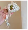 Nuevo Estilo Chino Super Hada Atmósfera Flor Borla Pasador para el Cabello Mujer Lujo Ligero Gama Alta Nicho Pinza Lateral Accesorios Exagerados
