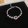 Pulsera Colgante Ovalado Flor de Circonita Cúbica Estilo Coreano Lujo Ligero Sensación de Alta Gama Anillo de Mano Moda Exquisito Versátil Joyería de Mano Venta al por Mayor