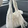 Bolsa de lona floral de encaje fresco estilo coreano para mujer, nuevo modelo 2026, bolso de hombro tipo tote de gran capacidad, bolso para llevar debajo del brazo para el trabajo