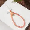 Corrente de celular vermelha flutuante de gelo com jade Hetian cera de abelha estilo chinês arte clássica cordão de pulso presente de deusa