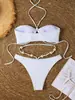 Traje de baño de dos piezas para mujer para comercio exterior transfronterizo, color liso con cuello halter y tirantes cruzados, cadena de conchas, diseño hueco y bikini de atar