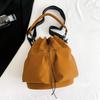 Bolso tipo cubo con cordón informal de celebridad de Internet para mujer, nuevo bolso de mano de gran capacidad estilo deportivo para exteriores, práctico bolso de mensajero para el hombro