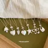 Collar Colgante de Flor Estrella Geométrica Japonés y Coreano Más Vendido, Cadena para Clavícula de Lujo Ligero Nicho de Gama Alta, Joyería Estilo Ins para Mujer