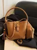 Bolso Cubo de Moda Transfronterizo para Mujer 2026 Estilo Nuevo de Primavera Bolso de Hombro Único Cruzado Bolso de Mano para Viajes Simplemente Versátil