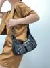 Bolso de motocicleta de gran capacidad para mujer 2025 nuevo bolso dumpling de moda que combina con todo bolso de axila bolso de hombro mensajero
