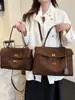 Bolso de mano tipo tote transfronterizo, gran capacidad, nuevo modelo de moda 2026, bolso de gamuza, bolso grande de hombro y cruzado para mujer