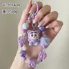 Llavero de cuentas de moda nuevo estilo pareja cadena para teléfono Ins colgante figura de resina accesorios pequeños suministro al por mayor