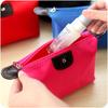 Bolsa de cosméticos pequeña estilo coreano, bolsa de cosméticos color caramelo, bolso de mujer, bolso de bola de masa, bolsa de lavado plegable impermeable, venta al por mayor